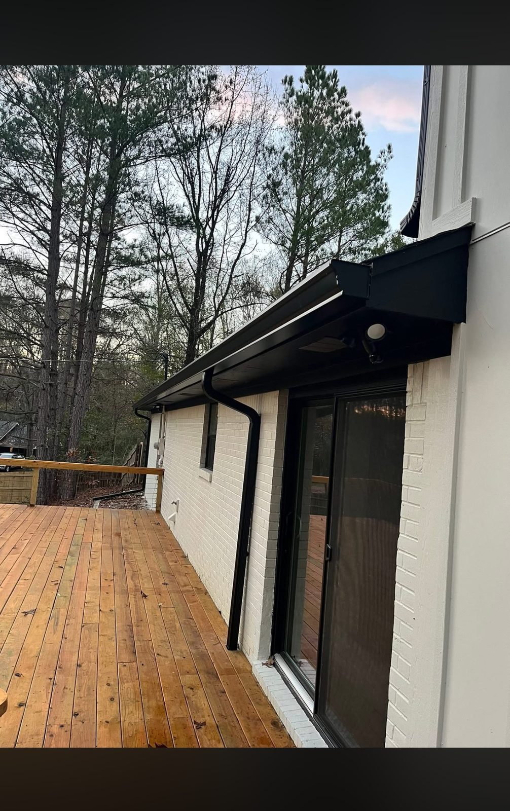 New matte black gutter run and downspout
