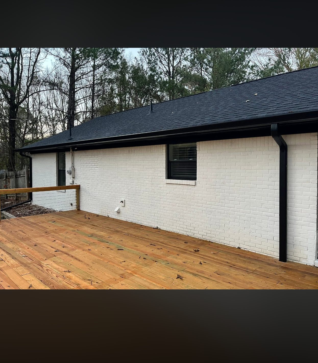 Long matte black seamless gutter run